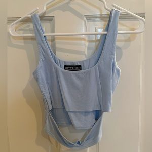Kittenish light blue crop top with cutout SMALL
